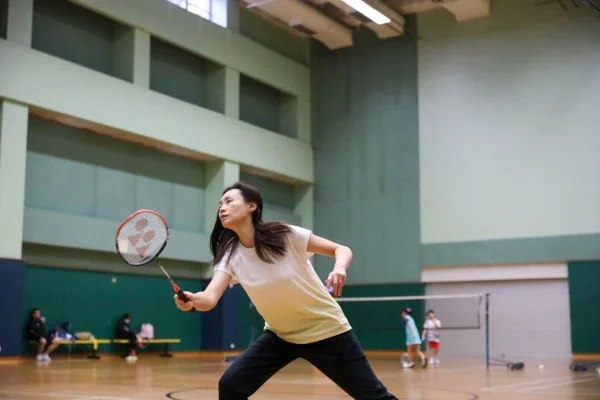 badminton match court action